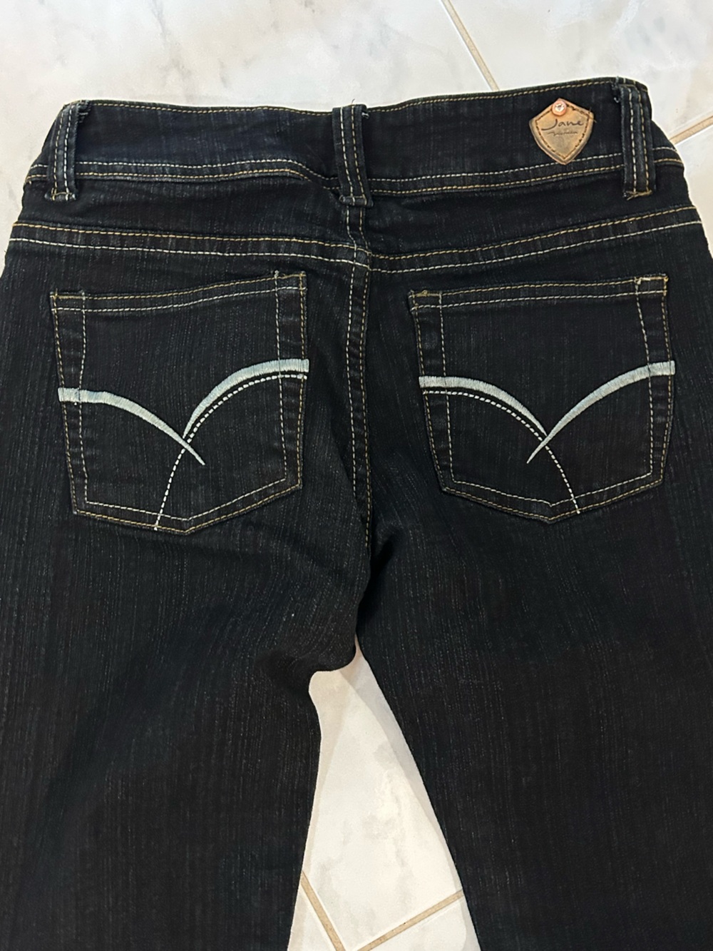 Jane Norman dark blue denim jeans.  Back pocket stitching.  EUC!